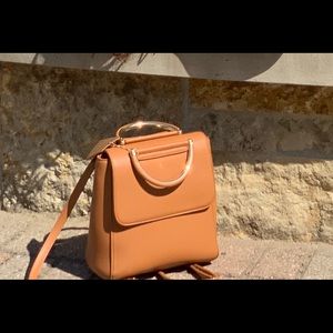 selling 2 handbags, 1 is convertible to a backpack